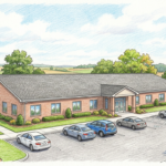 Exterior of a single-story rural community hospital with a small parking lot.
